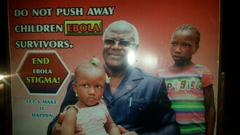A billboard encouraging tolerance of Ebola survivors