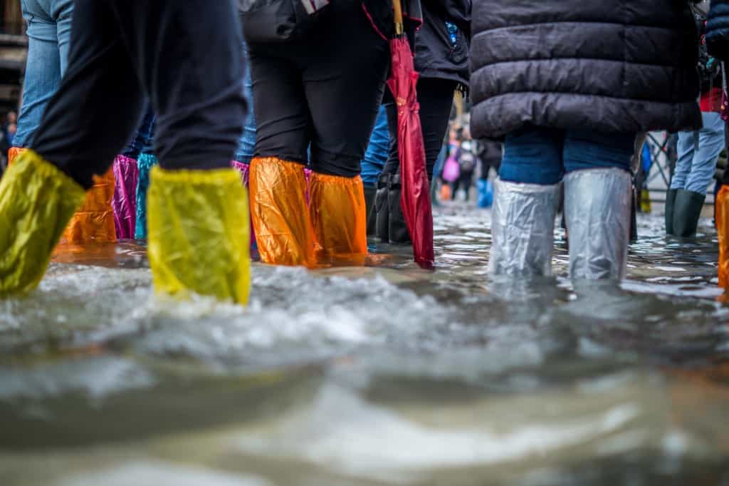 flood Venice on the brink — Dual threats of mass tourism and climate change Kim Wright battleface.com